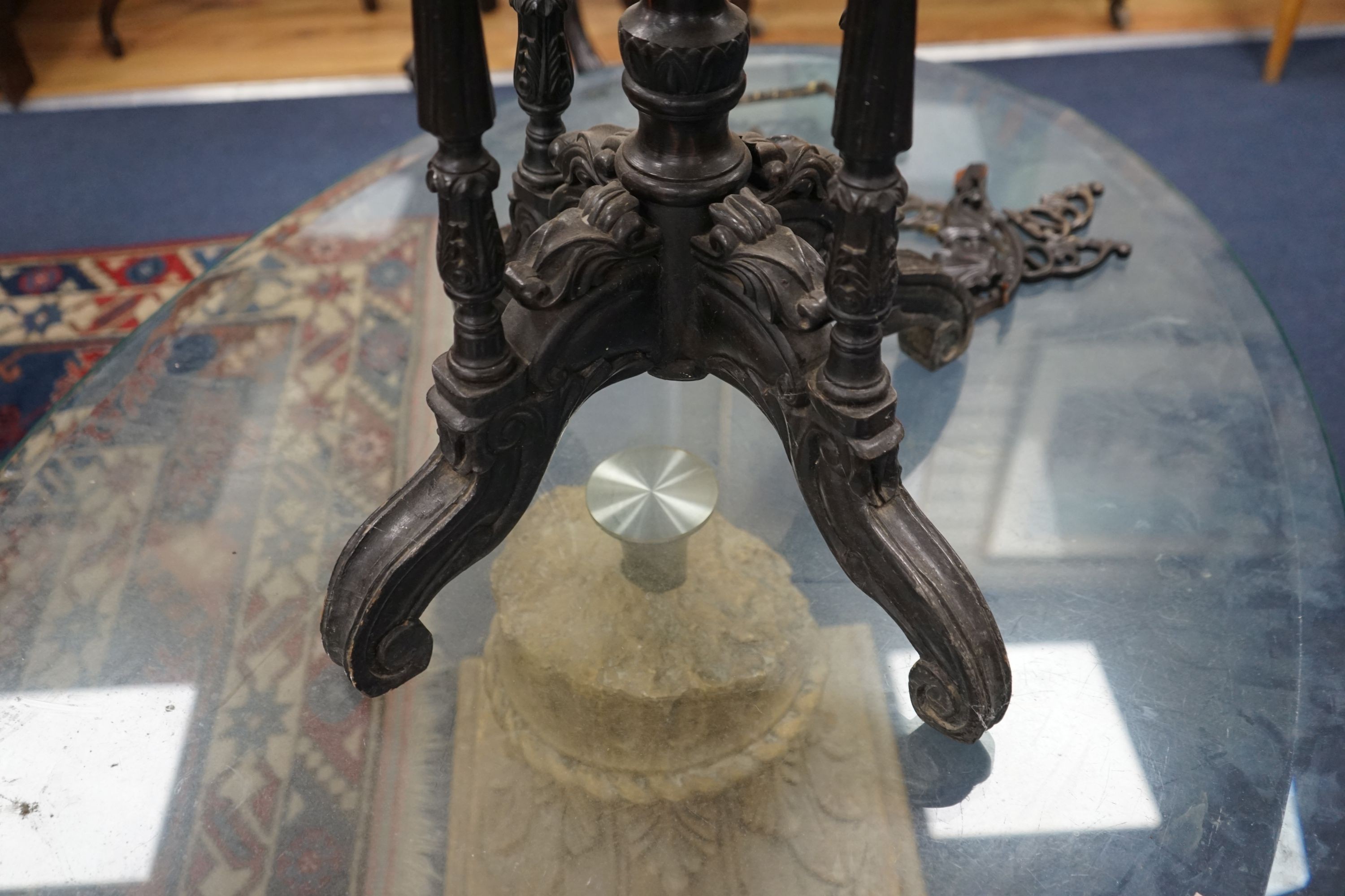 A 19th century Celanese carved ebony and coromandel veneered octagonal occasional table, width 57cm, depth 42cm, height 70cm